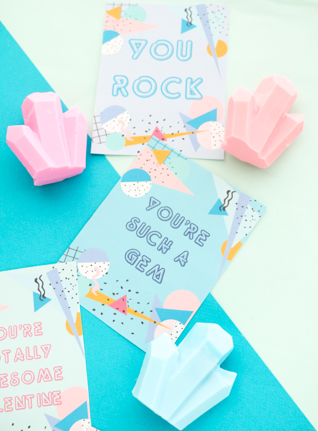 Light and bright blue background with colourful valentines and pink gem shaped soaps