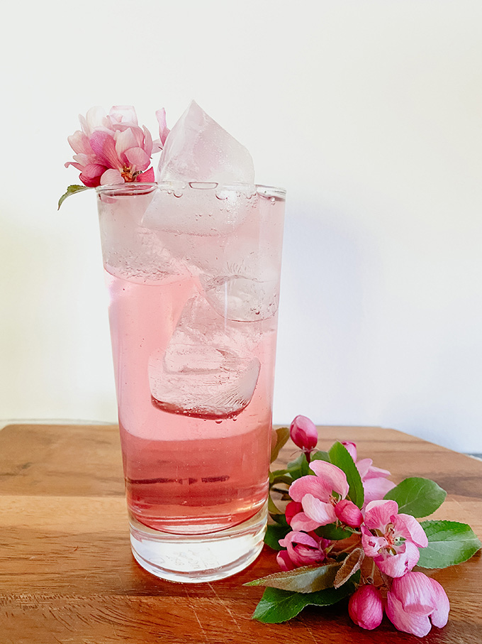 Harvest crabapple blossoms to make this simple syrup to sweeten your drinks with